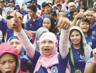 Workers in Indonesia strike for higher wages