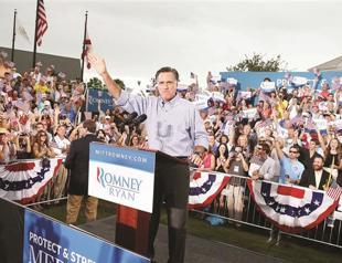 Romney surges ahead in tight White House race