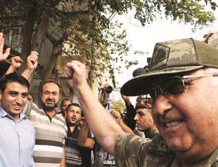 Turkey warns of tougher response on Syria shelling