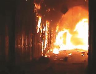 Clashes in Aleppo as fire engulfs souk