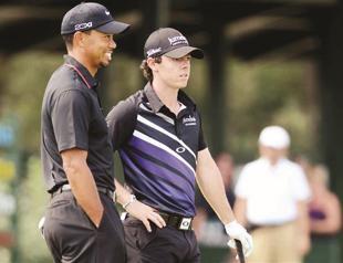 McIlroy plays down rivalry with Woods