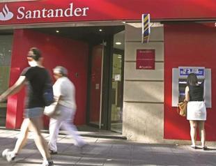 S&P downgrades 7 Spanish large banks