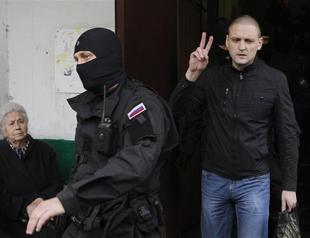 Russia probes Putin protest leader over mass riot plot