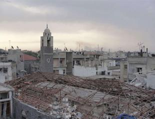 Warplanes batter Syrias Homs as Turkey returns fire