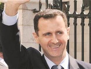 Assad lays wreath at Damascus ceremony