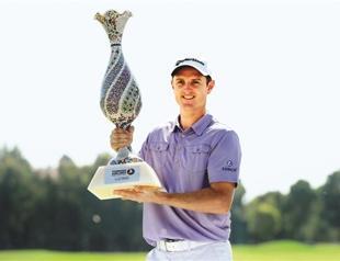 Rose beats Westwood for $1.5 million