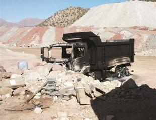 PKK kidnaps two, burns vehicles