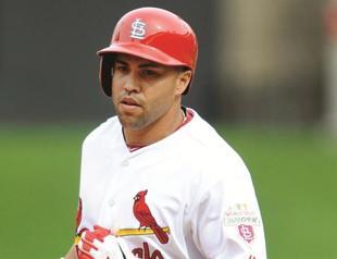 Cardinals bullpen cuts down Giants