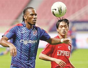 Drogba back as salary row rumbles