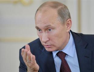 Putin backs secular values after school bans hijabs
