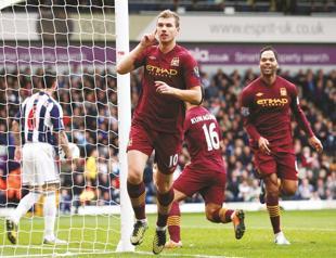 Man City faces Ajax in CL survival battle