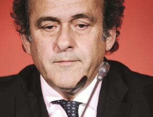Platini promises hard action against racism