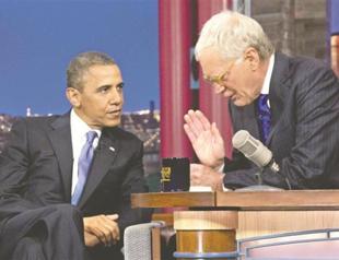 Obama jabs at Romney over video