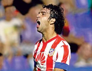 Titleholder Atletico out to extend win streak at Hapoel