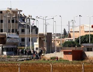 Syrian clashes reach doorstep of Turkey