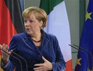 Merkel says exit from euro crisis to take at least five years