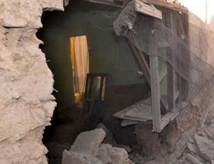 Syrian artillery hits Turkish neighborhood