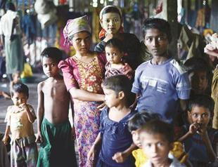 Influx hits Myanmar camps