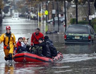 First metro trains run in storm stricken New York