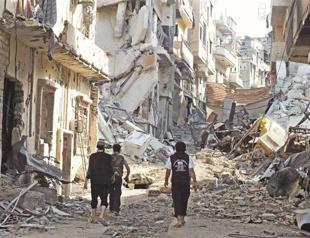 Rebels shell pro-Assad district in Damascus