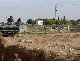 26 dead in Syria clashes near Turkey border: watchdog