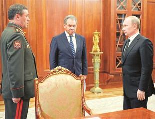 Putin sacks military chief after minister