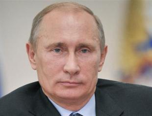 Russian President Putin dismisses defence minister