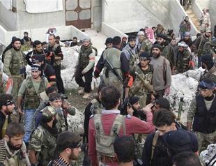 UK backs safe exit for Assad as violence rises