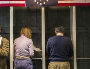 Reds and Blues anxiously await first exit poll results