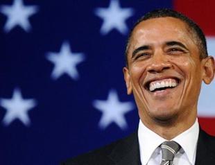 Obama secures second term, makes history again