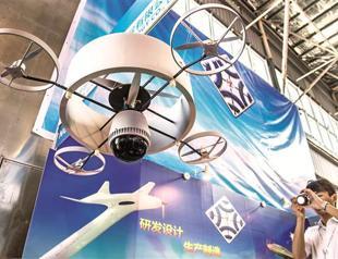 China parades arms as US firm on Pacific shift