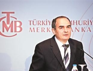 Central bank cuts rates, hints at stronger action