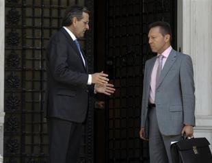 Greek PM: Greece on the brink, can survive one more month