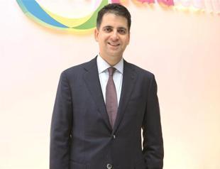 Greek bank postpones share sale in Finansbank