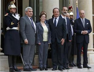 Syria slams hostile French offer to host coalition envoy