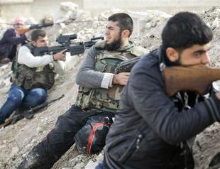 Iran warns against arming Syrian rebels