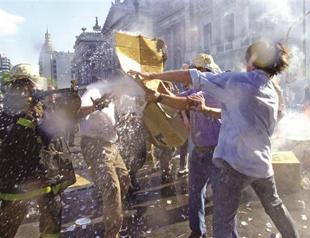 Fitch cuts Argentina rating, says second default possible