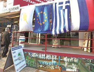 Bailout deal approved, Greek Cypriots claim