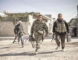 Syria cautions on Patriots, NATO reassures Kremlin