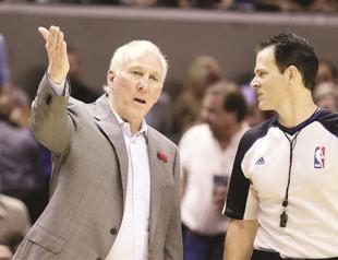 Spurs shrug off fine, beat Memphis