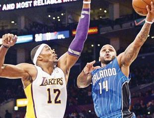 Orlando gets better of Howard, stuns Lakers