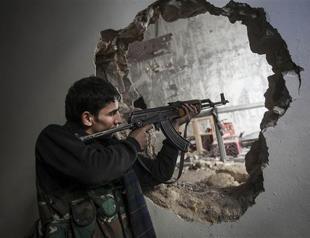 Syria rebel attack on school kills 9 students, teacher: TV