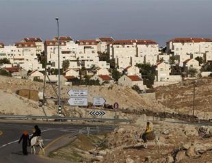 Israel holds firm on settlements, world outcry grows
