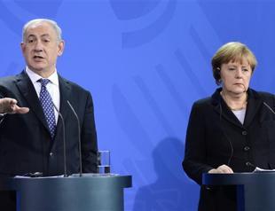 Merkel says disagrees with Israel on settlements