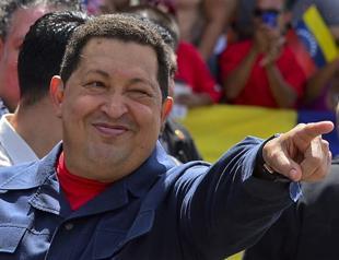 Chavez returns from Cuba after cancer treatment