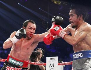 Bloodied Marquez knocks out Pacquiao in sixth