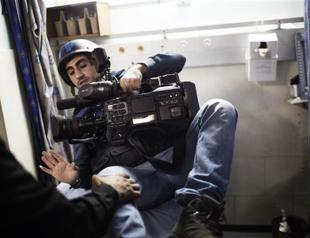 Israeli soldiers assault two Reuters cameramen