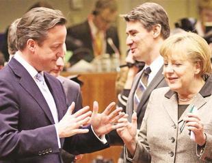 EU leaders promise further steps to quell economic crisis