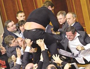 Ukraine Parliament erupts in brawl as PM re-appointed