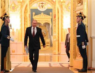 Putin denounces foreign-funded opponents